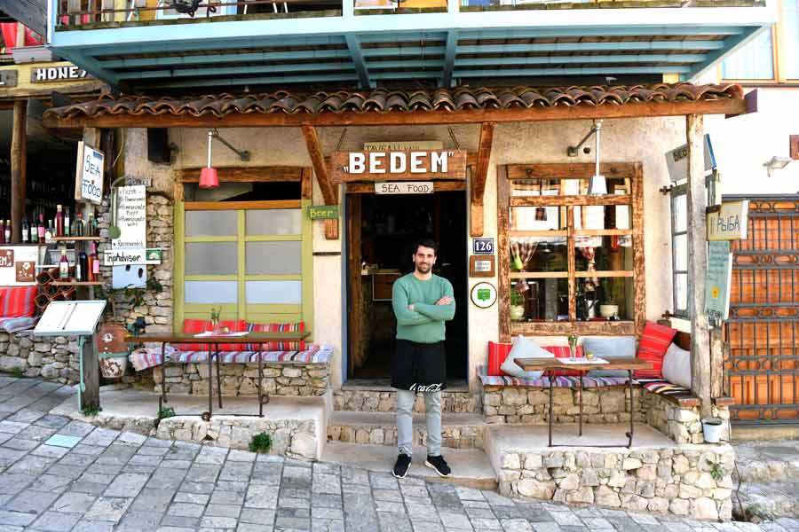 The owner stands outside of Cafe Bedem, Bar, Montenegro